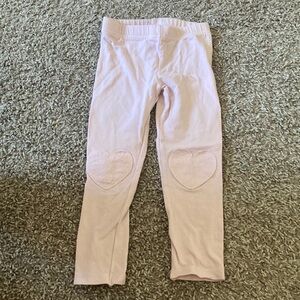 Toddler girls pink leggings with hearts on the knees. Size 3T. Good condition